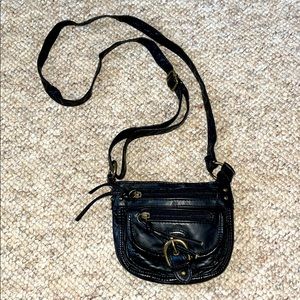 black small purse with long adjustable strap